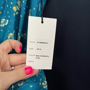 A butterfly print romper from Unique Vintage